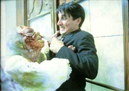 Lionel trying to stop his dead mommy by some tranquilizator...