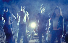 Cool guys standing in the night...